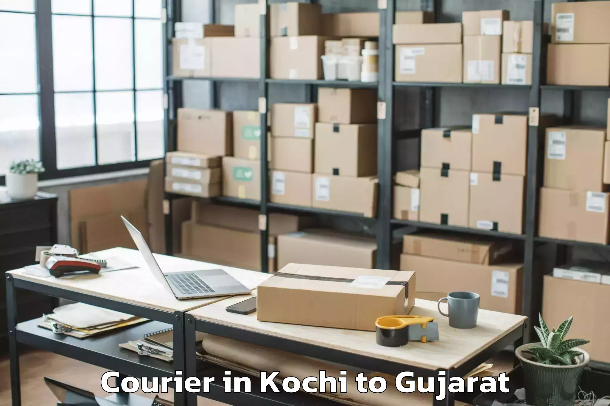 Book Kochi to Junagadh Agricultural Universi Courier Online